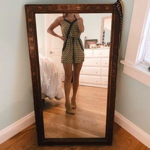 Aztec print romper with floral detailing